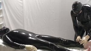 Mrs. Dominatrix and her experiments on a slave. 2 angle