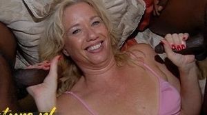 Insatiable Platinum-Blonde COUGAR Deep-Throating On 2 BBCâ€™s At Once