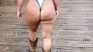 Wife in thong swimsuit
