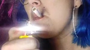 'Pretty Face Close Up Smoking Fetish Lots of Cig Dangling Lighting'